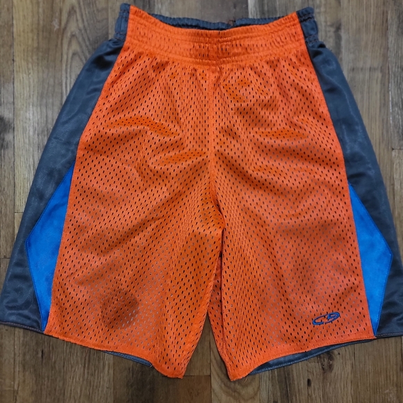 8/$12 Boys reversible mesh shorts - Picture 2 of 9